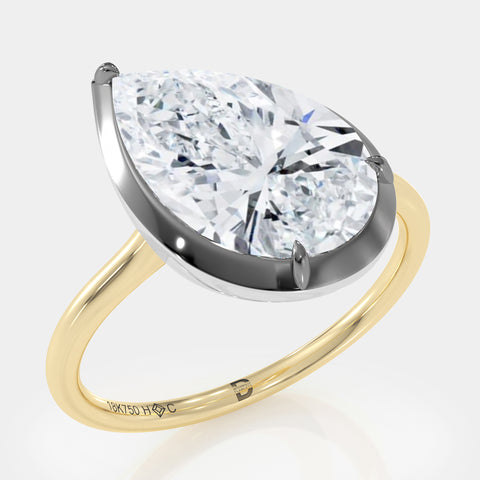 Two-Tone Tilted Pear Diamond Ring